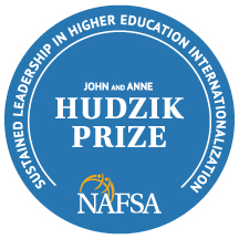 Blue round logo for the Hudzik Prize