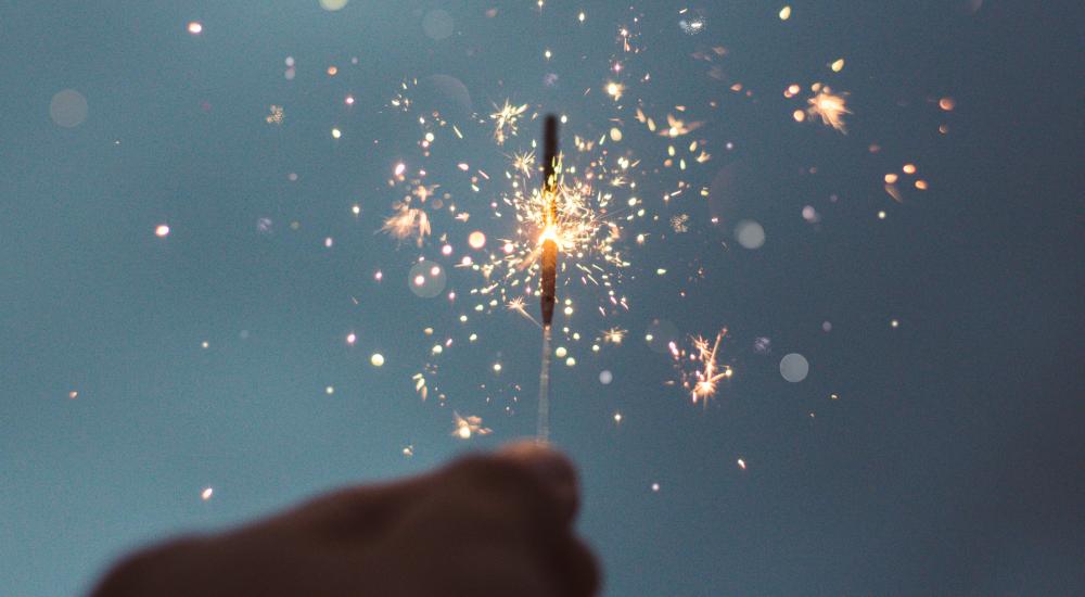 Sparkler against a sky background