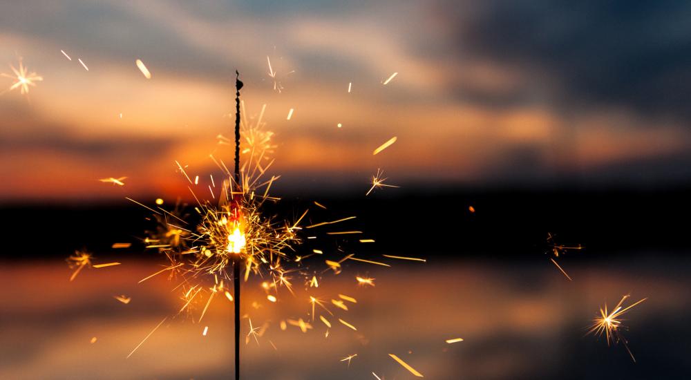 Sparkler against a sunset