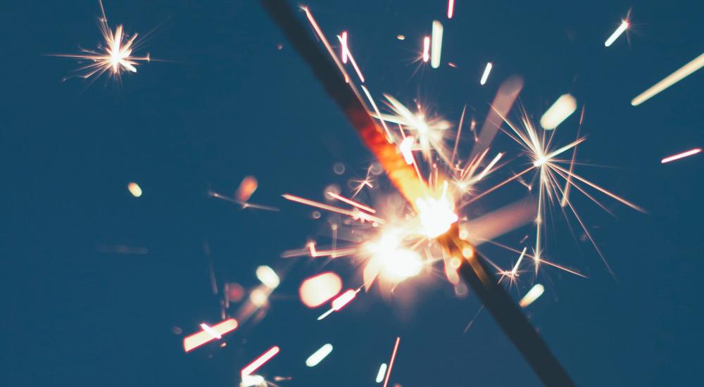 Sparkler against a blue background