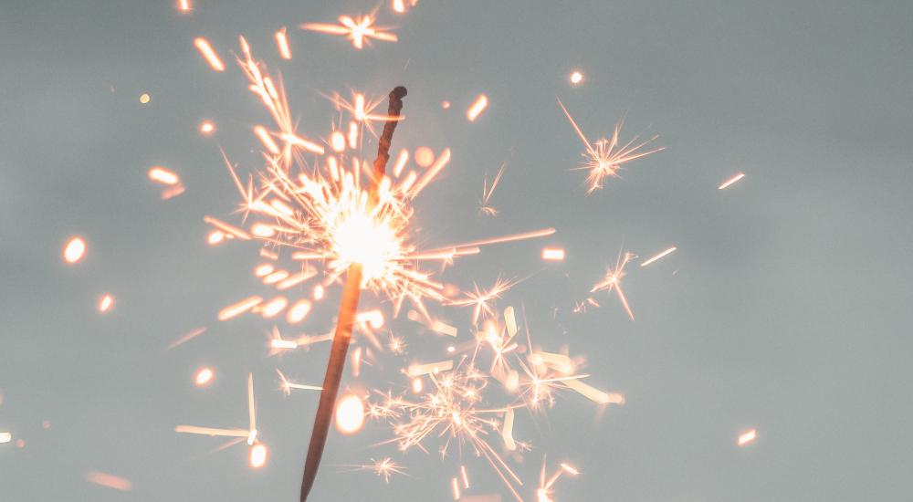 Sparkler against a sky background