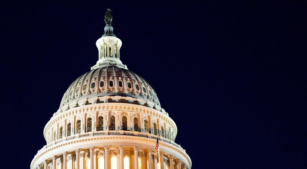 The US Capitol building at night