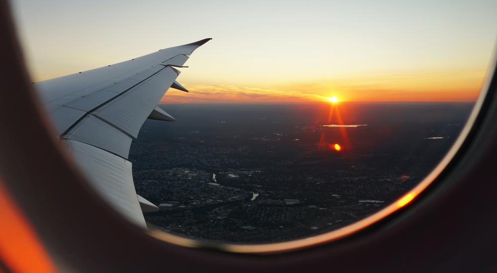 View of a sunset out of a plane window