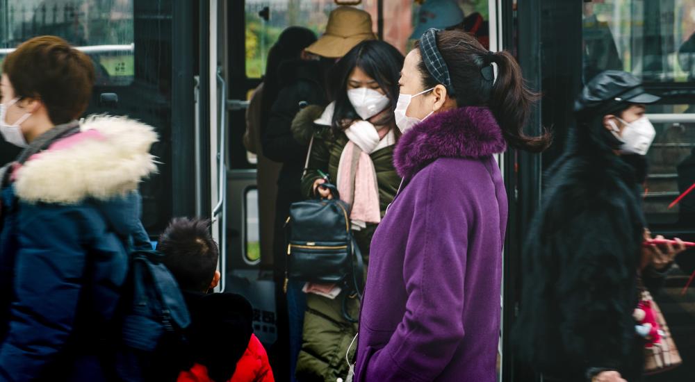 People in China wearing surgical masks