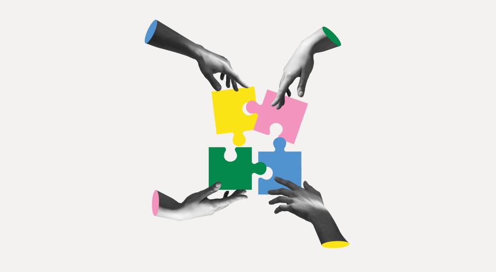 illustration of four hands putting puzzle pieces together