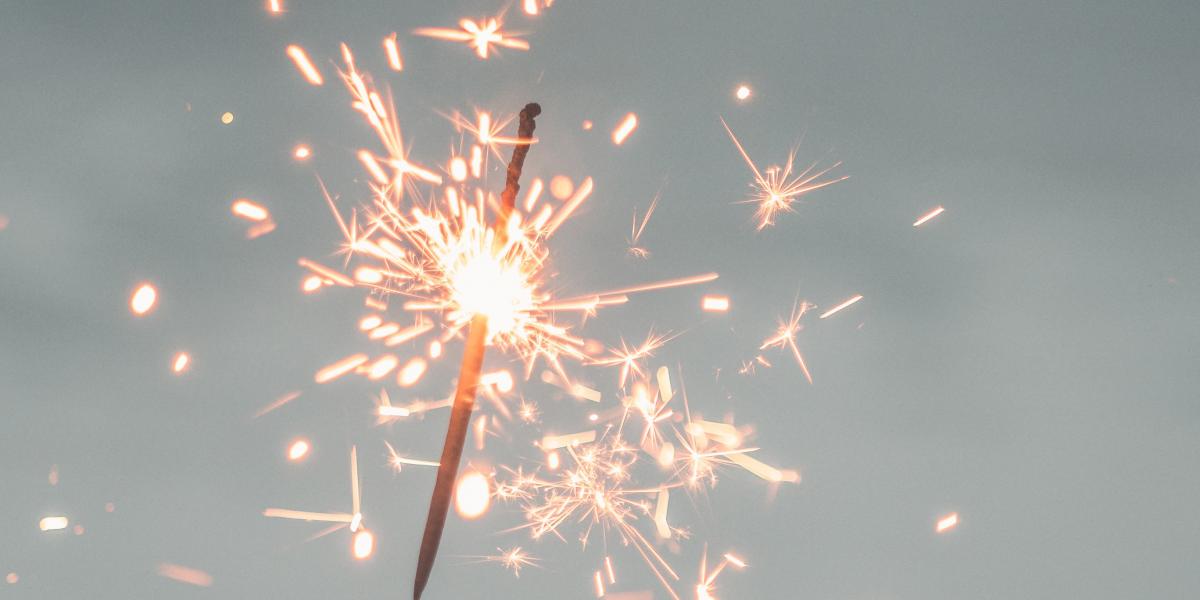 Sparkler against a sky background