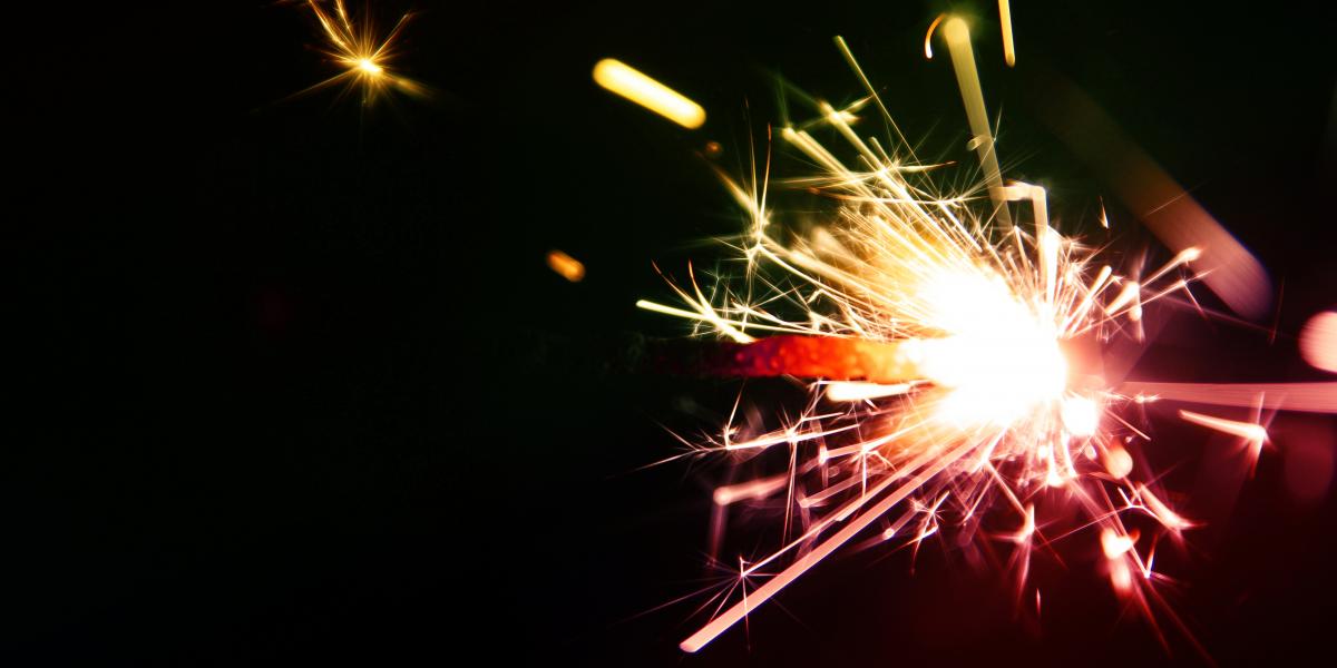 Colored sparks against a black background