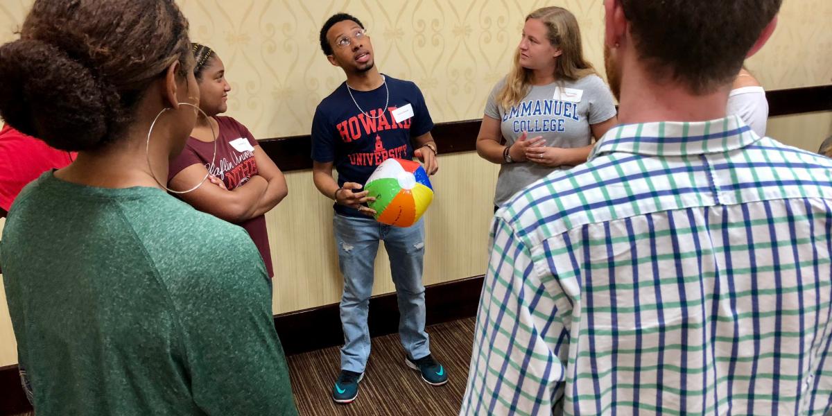 A group of students standing in a circle