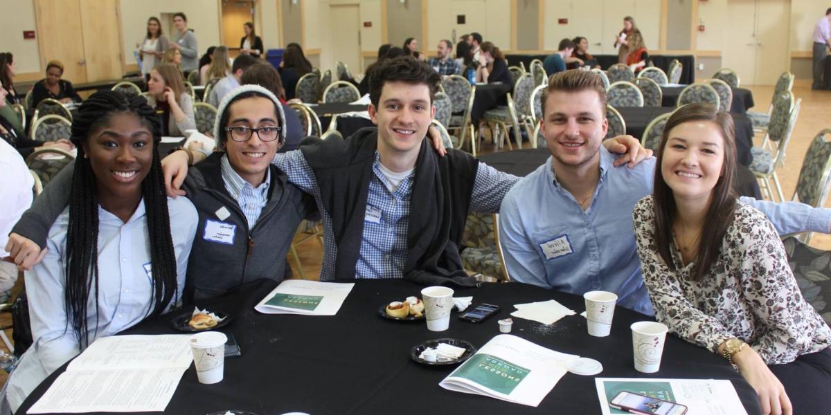 students at a round table