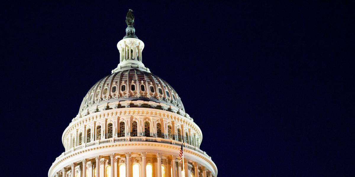 The US Capitol building at night