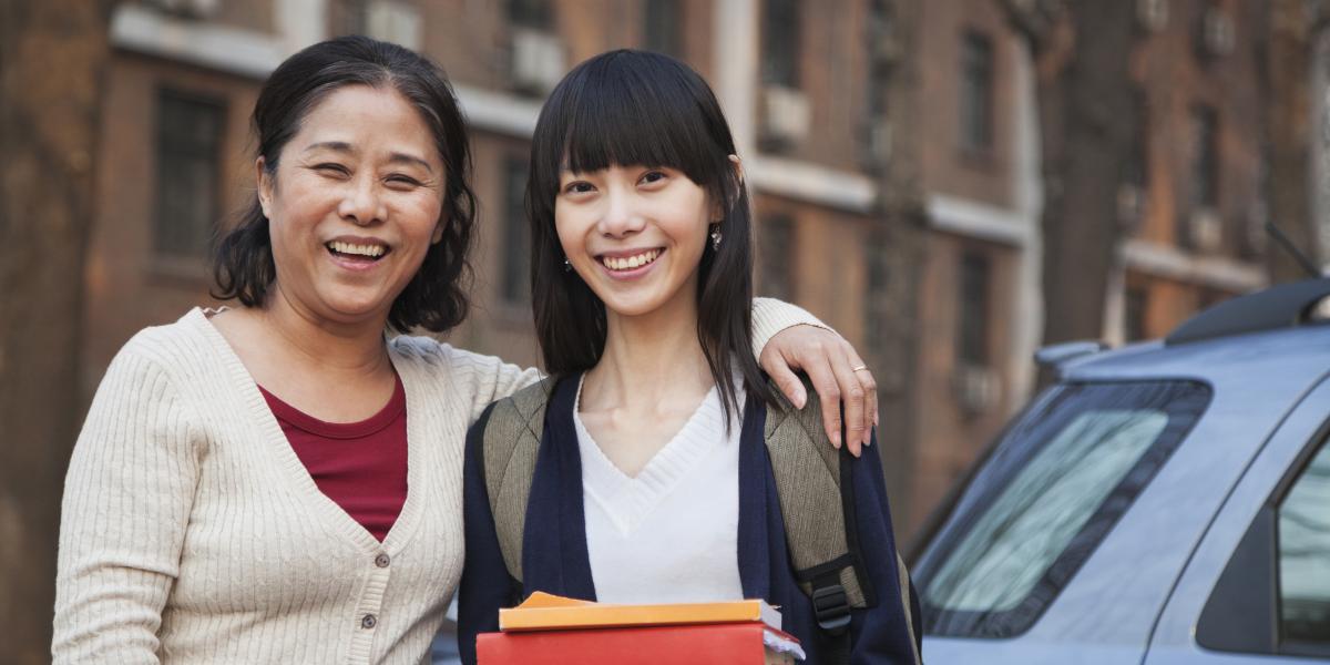 Photo of an international student and her parent