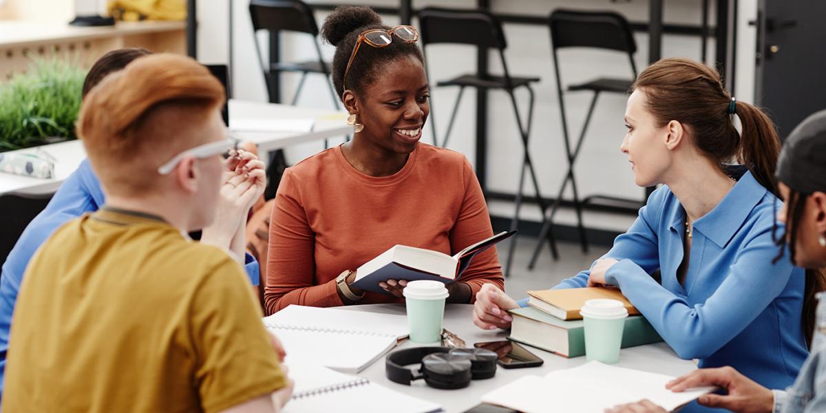 Group of students sitting at a table together