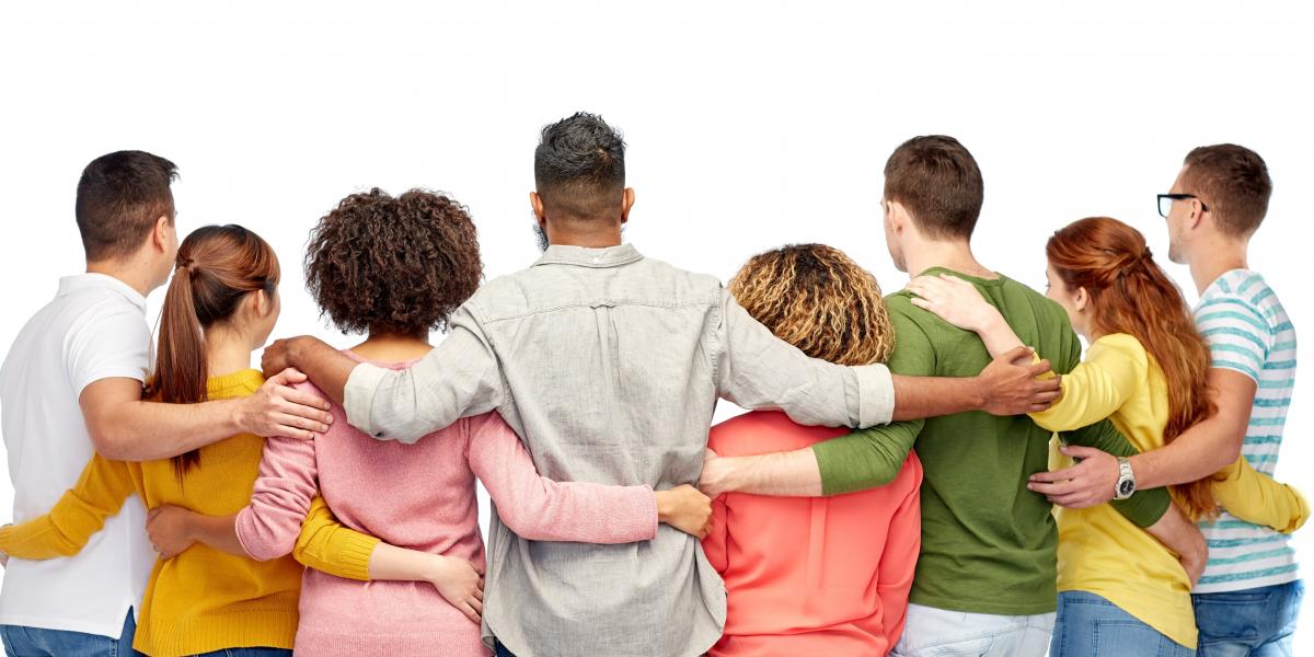 group of multiracial and multigenerational people standing together