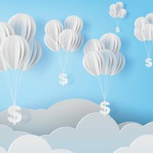 balloons with dollar signs floating above clouds