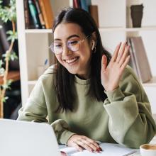 woman laptop waving_blog crop