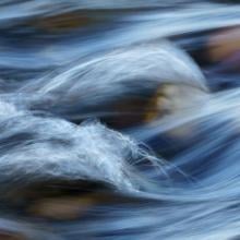 closeup image of small waves in water