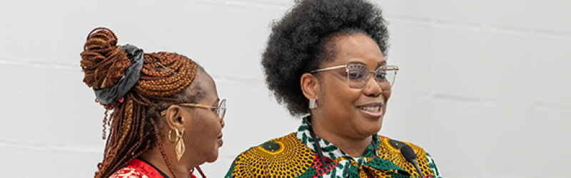 Two women speak at the Africa Forum